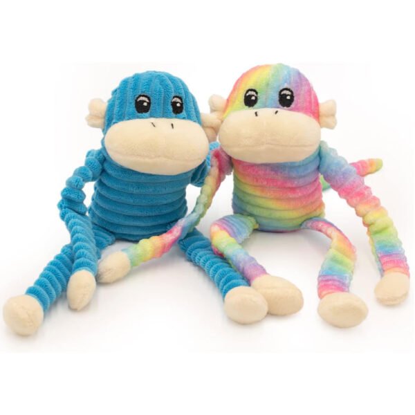 Two plush monkey toys, one blue with stripes and the other rainbow-colored, sitting on a white background, ready for playful adventures.