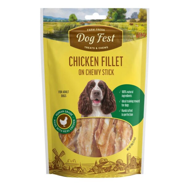 Packaging of ‘Chicken Fillet on Chewy Stick’ dog treats featuring a clear window displaying the product, with farm imagery and a happy dog in the background.