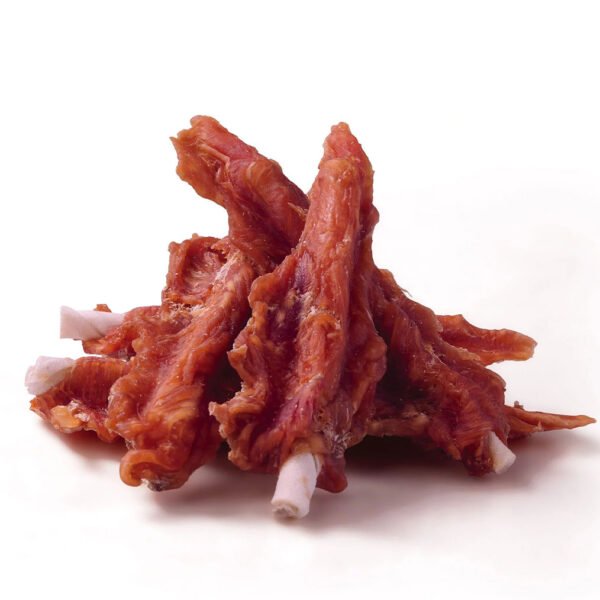 A pile of crispy bacon strips stacked on a white background.