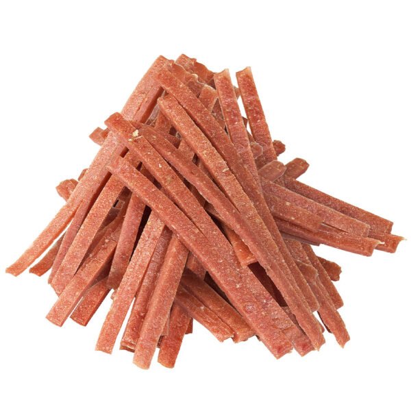 A close-up view of reddish-brown lamb slices arranged in a pile, showcasing their rough and grainy texture.