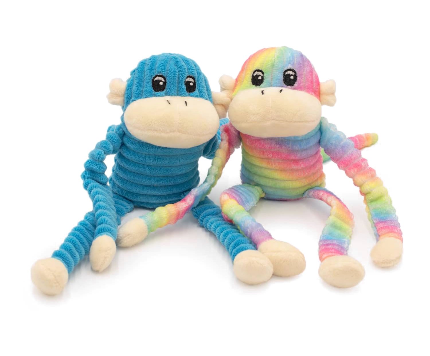 Two plush monkey toys, one blue with stripes and the other rainbow-colored, sitting on a white background, ready for playful adventures.