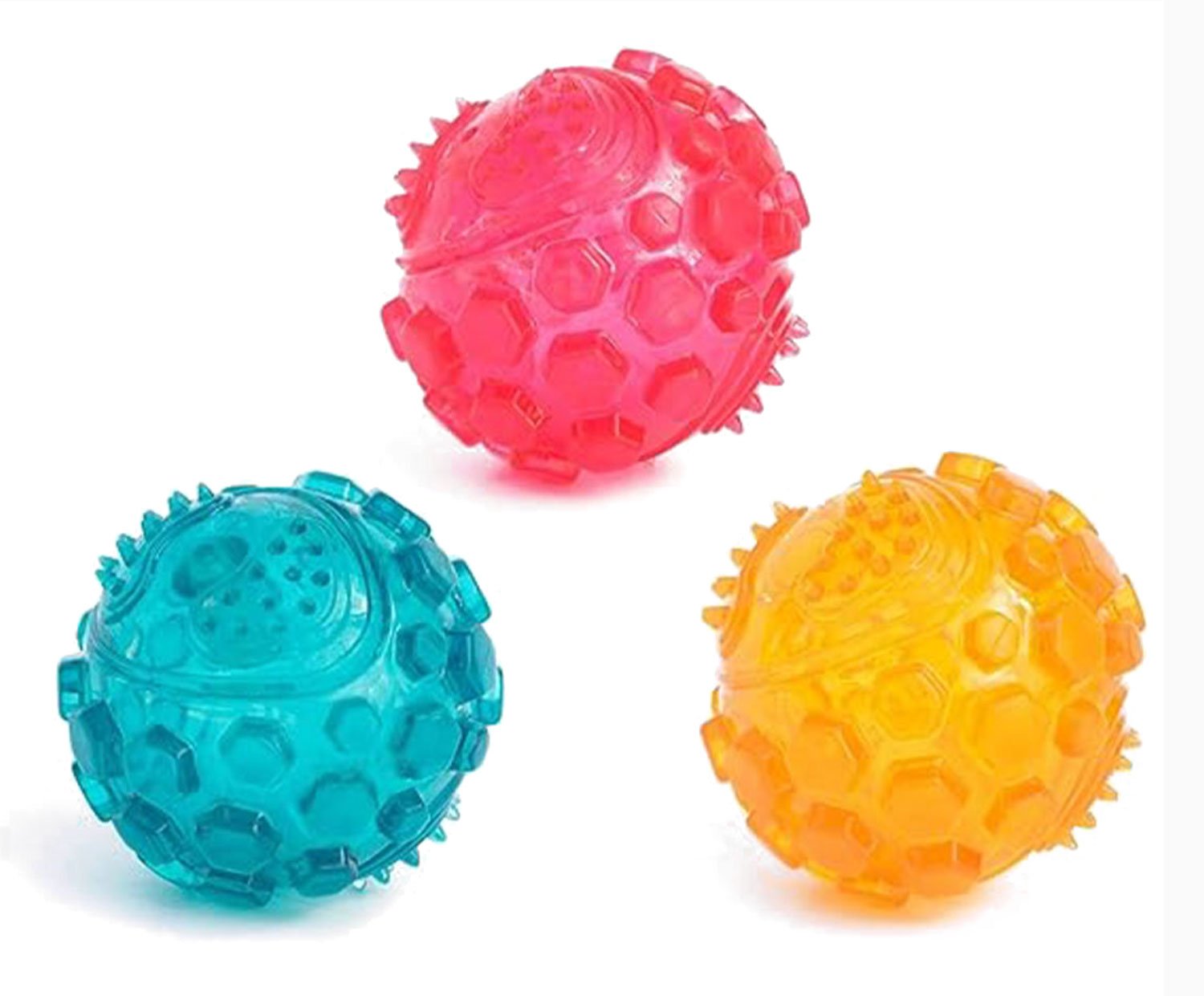 A collection of one piece each of the pink, yellow and teal zippytuff squeaker ball.