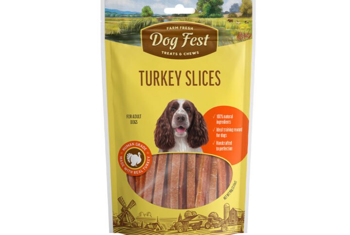 Packaging of “Dog Fest Treats & Chews Turkey Slices” featuring a happy dog, scenic farm background, and a clear window displaying the product.