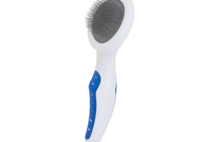 A white and blue JW Gripsoft Slicker Brush for cats, featuring a curved ergonomic handle and a rectangular brush head with thin metal bristles.