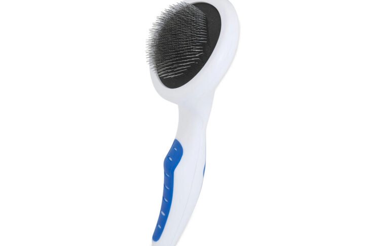 Image of a JW Gripsoft Slicker Brush for dogs, featuring a white oval head with thin metal bristles and an ergonomic blue and white handle.