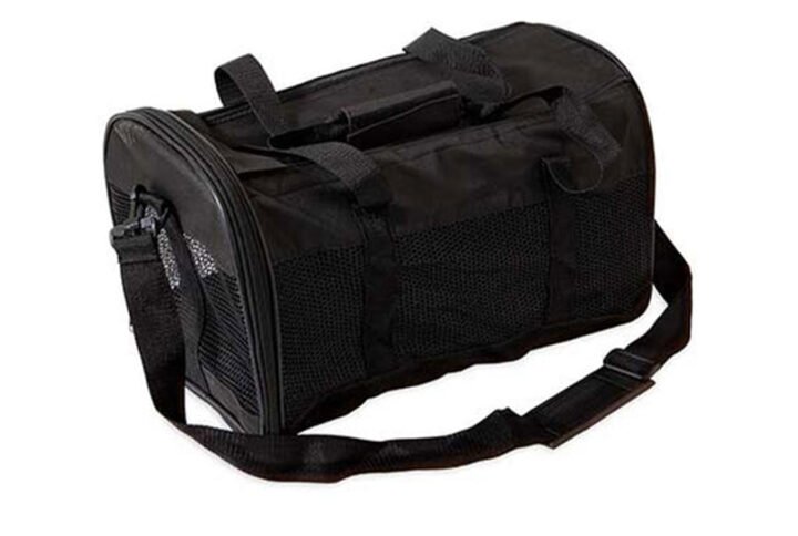 A black, soft-sided Petmate Kennel Cab featuring mesh panels for ventilation, a carrying handle, and an adjustable shoulder strap.