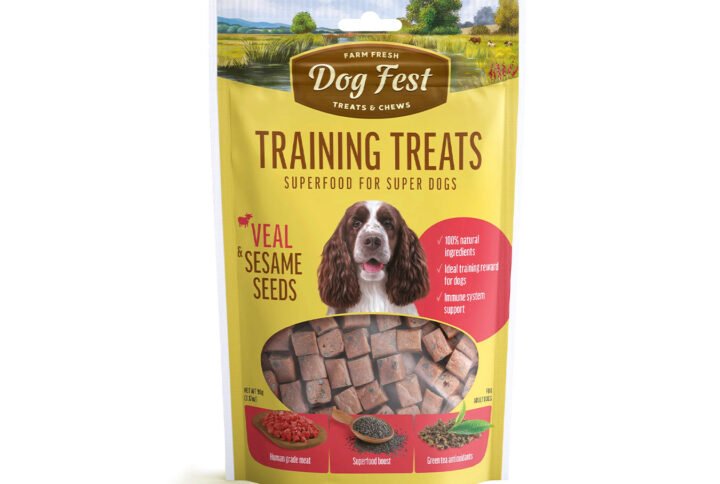 Packaging of Superfood Dog Fest Training Treats for Adult Super Dogs featuring Veal and Sesame Seed flavor, with an image of a Springer Spaniel dog and small, brown, bone-shaped treats.