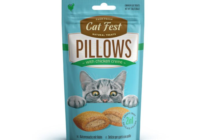 Packaging of Cat Fest Natural Treats Pillows, featuring chicken crème flavor, farm fresh, natural treats, and an adorable cat peeking over.