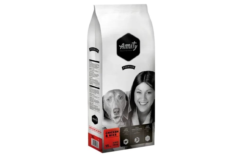 A bag of Amity Premium Dog Dry Food Chicken & Rice featuring a smiling woman with a Vizsla dog, highlighting the wholesome and easily digestible ingredients like high-quality chicken and rice for lasting energy.