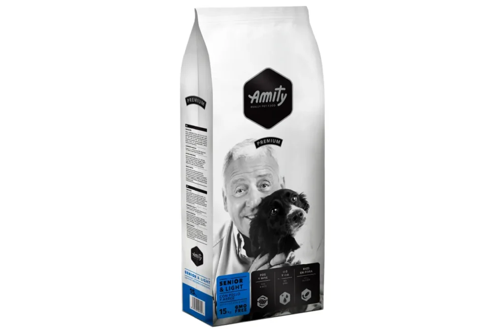 The front of a white bag of Amity Premium Dog Dry Food for senior and light dogs, with the product name and a dog graphic, representing the wholesome ingredients like dehydrated poultry protein, rice, Omega-3 & Omega-6, and essential vitamins & minerals for healthy aging and weight balance.