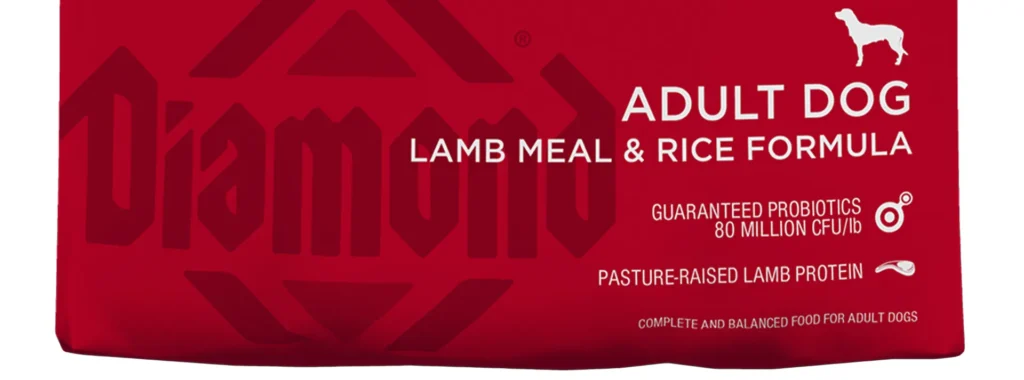 Close-up of the Diamond Naturals Adult Dog Lamb Meal & Rice Formula bag, highlighting "Pasture-Raised Lamb Protein" and "Guaranteed Probiotics."