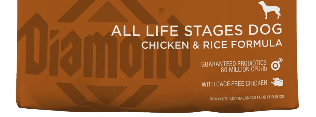 Close-up of the Diamond Naturals All Life Stages Dog Chicken & Rice Formula bag, highlighting "All Life Stages Dog" and "With Cage-Free Chicken."