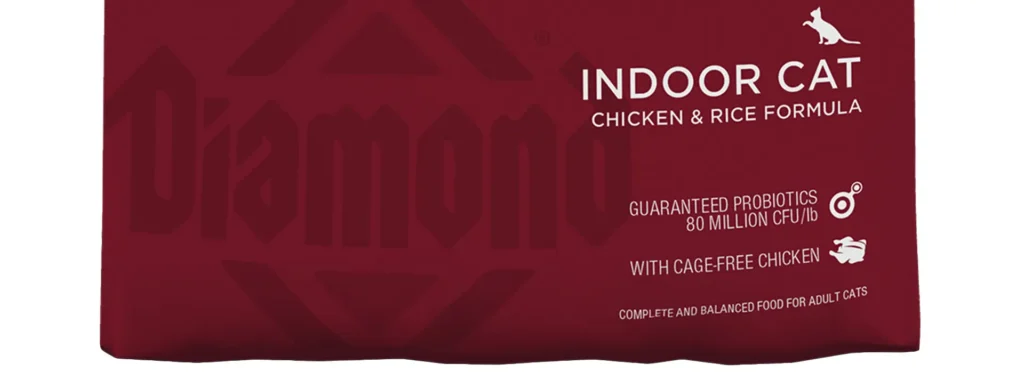 Close-up of the Diamond Naturals Indoor Cat Chicken & Rice Formula bag, highlighting "Indoor Cat" and "With Cage-Free Chicken."