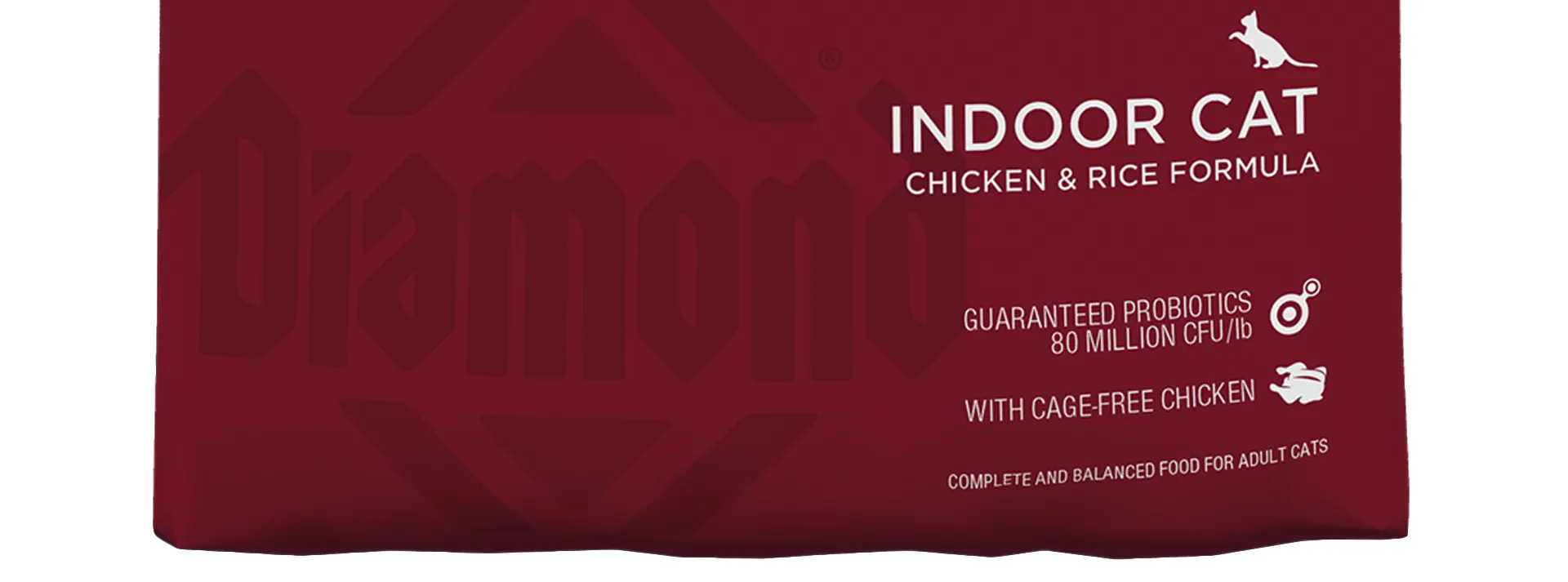 Close-up of the Diamond Naturals Indoor Cat Chicken & Rice Formula bag, highlighting "Indoor Cat" and "With Cage-Free Chicken."