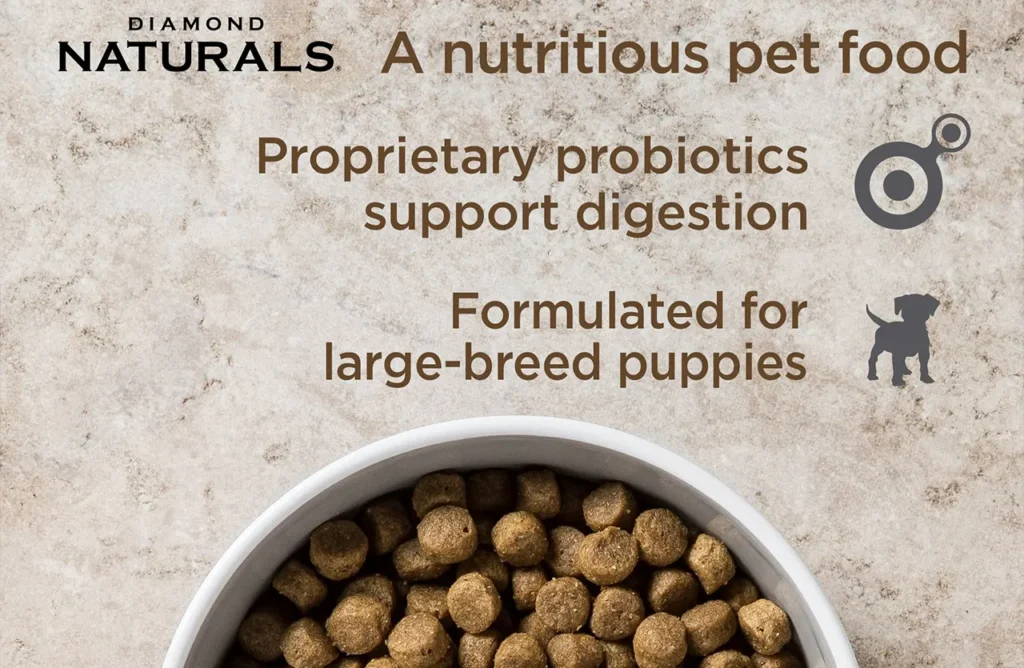 Close-up of Diamond Naturals kibble in a bowl with text highlighting "Proprietary probiotics support digestion" and "Formulated for large-breed puppies."