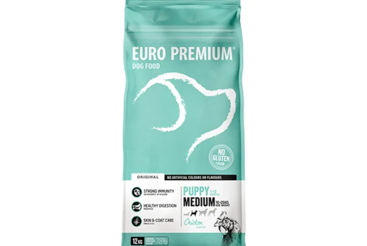 Studio shot of Euro Premium Medium Puppy Chicken & Rice bag, featuring the brand logo, health benefits, and gluten-free claim.