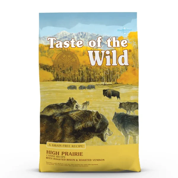 Front view of Taste of the Wild High Prairie Canine Recipe dog food bag showing a scenic illustration of wolves observing grazing bison on a prairie, with bold branding and grain-free callouts.