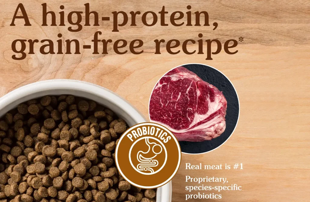 Close-up of Taste of the Wild High Prairie puppy kibble in a bowl next to raw meat, highlighting the quality and representing the easy feeding aspect described in the "Enjoy Effortless Feeding Every Time" section.